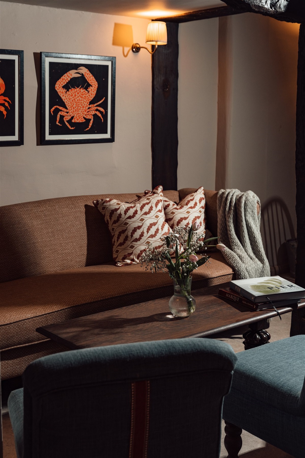 leather banquette and crab painting in hotel restaurant