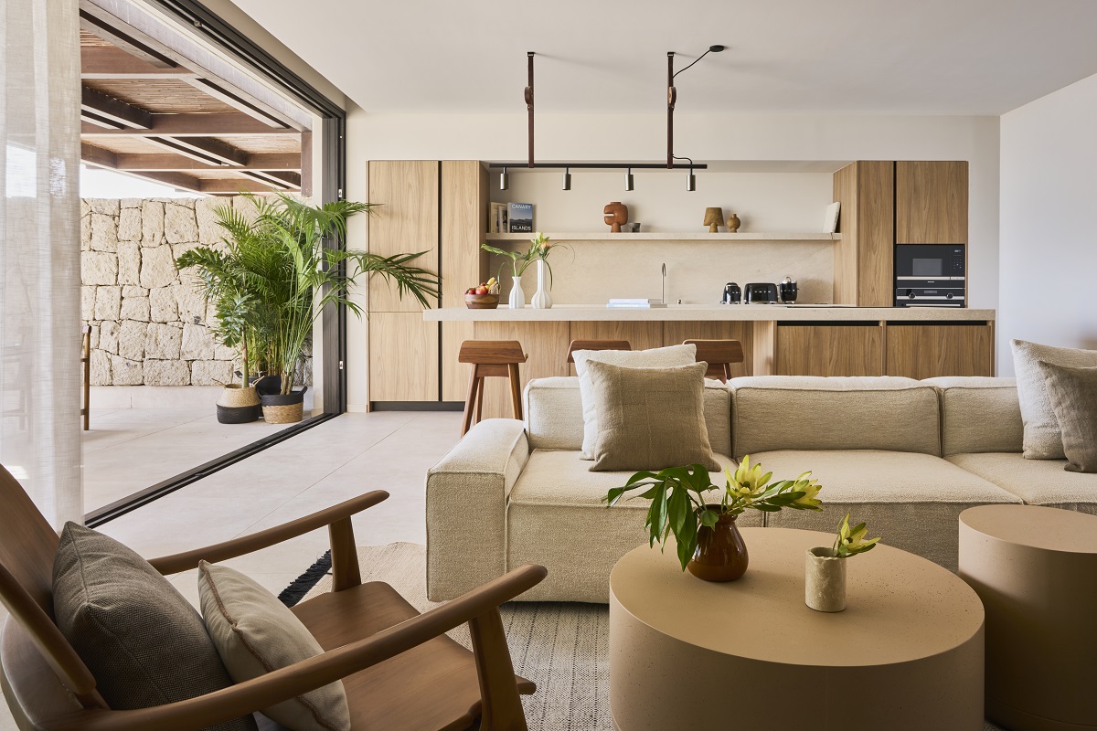 indoor - outdoor space and living area in villa designed by K-Studio