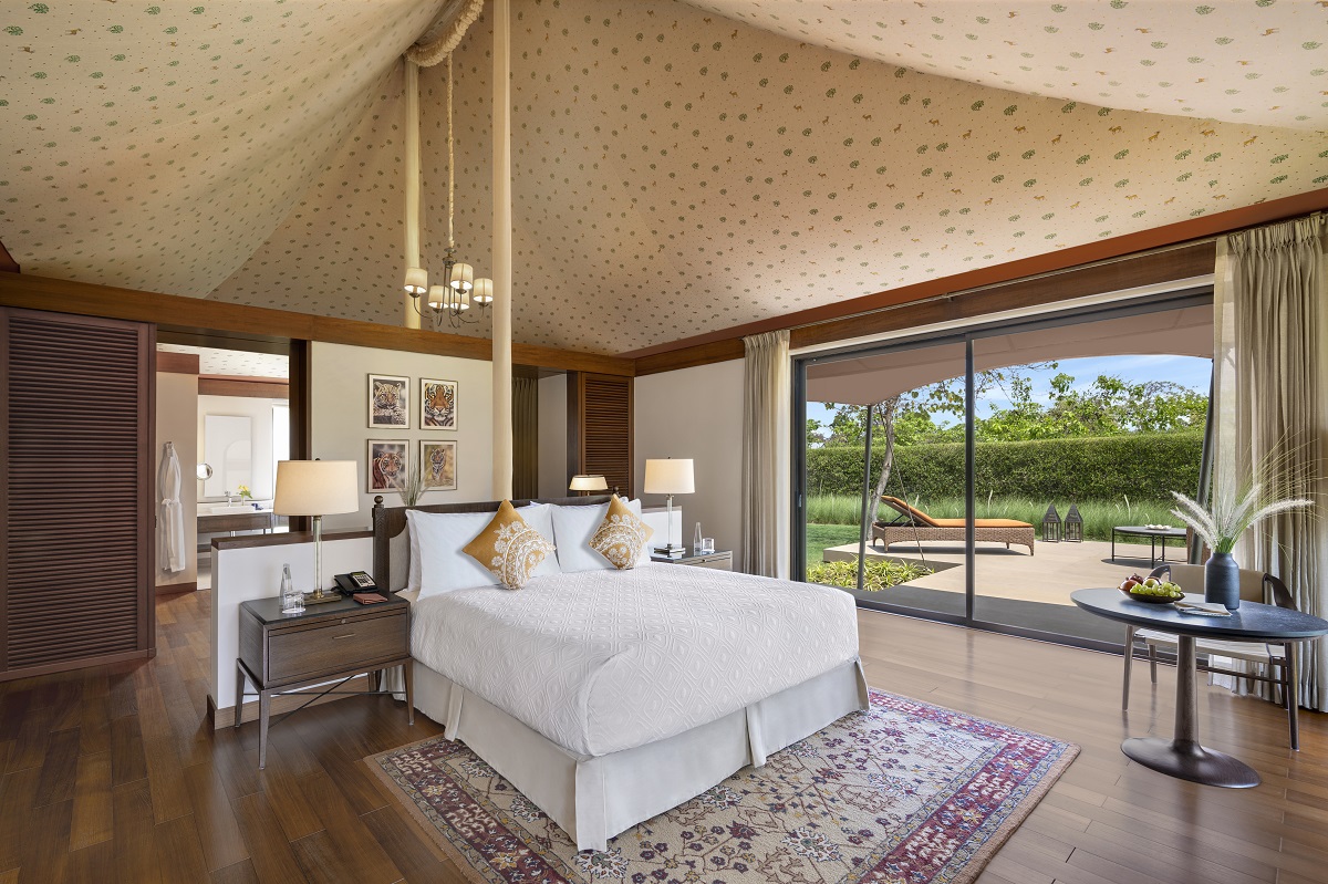 tented bedroom with glass floor to ceiling door The Oberoi, Bandhavgarh