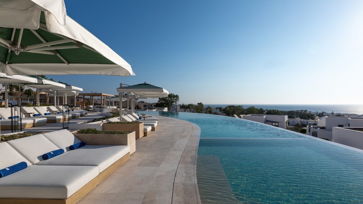 sunloungers and infinity pool at Sandblu resort Santorini