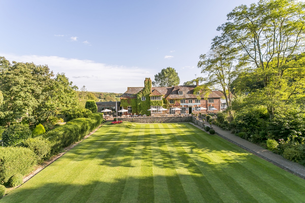 aerial image of croquet lawn and hotel building at The Alfriston 