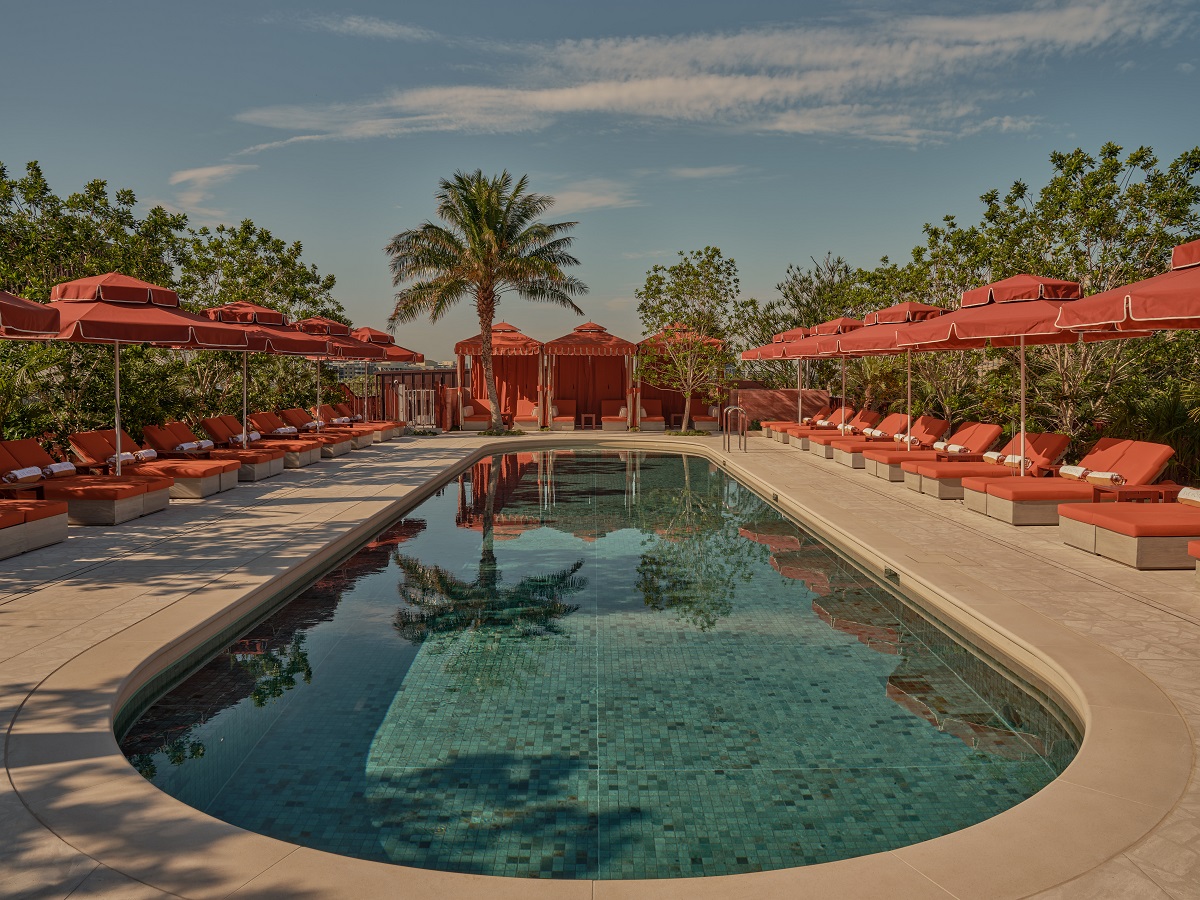 The EVE rooftop pool and orange umbrellas