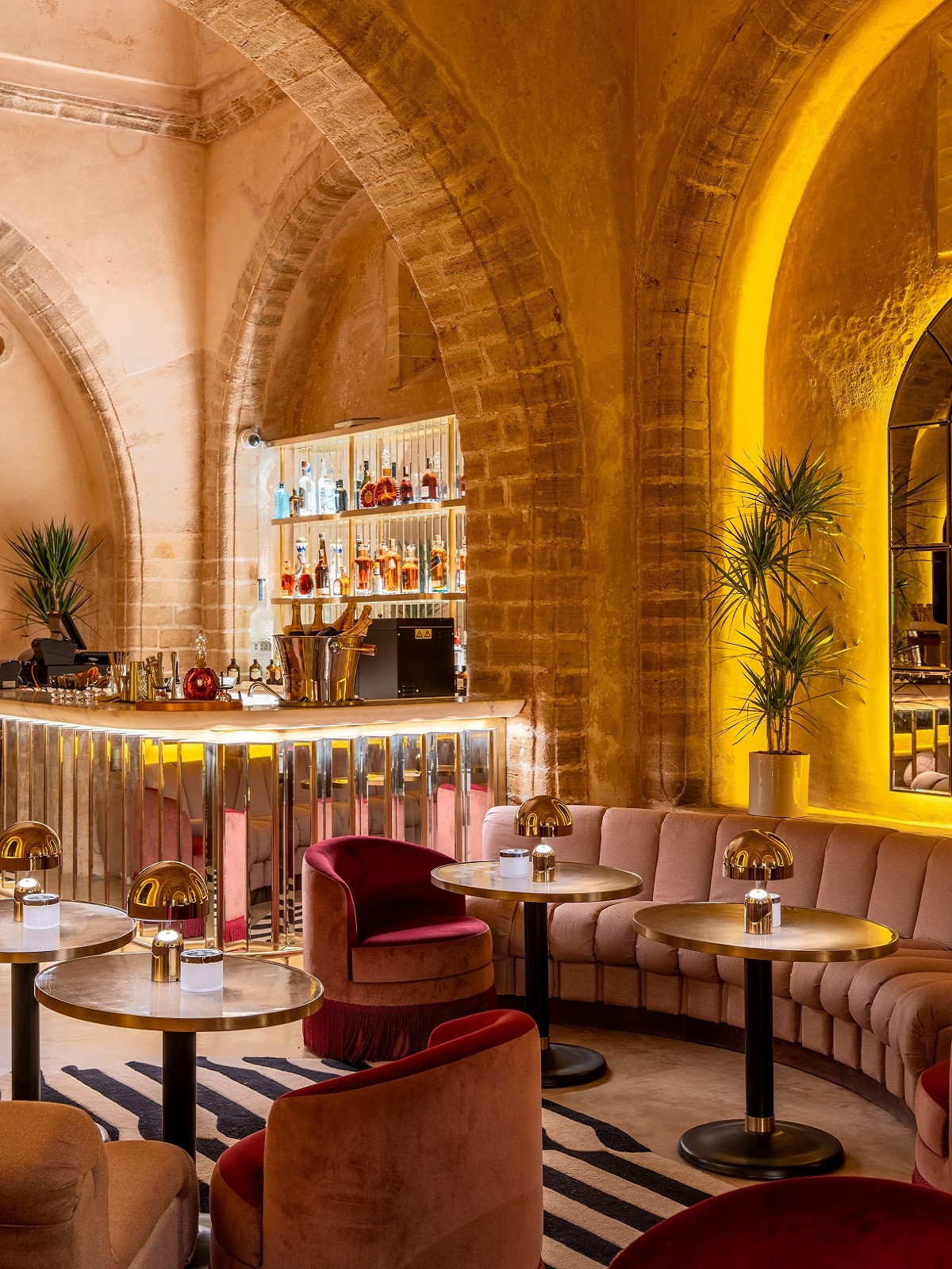 reflective bar and stone walls in Laila Lounge
