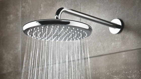 Close up of GROHE rainfall shower head with water on