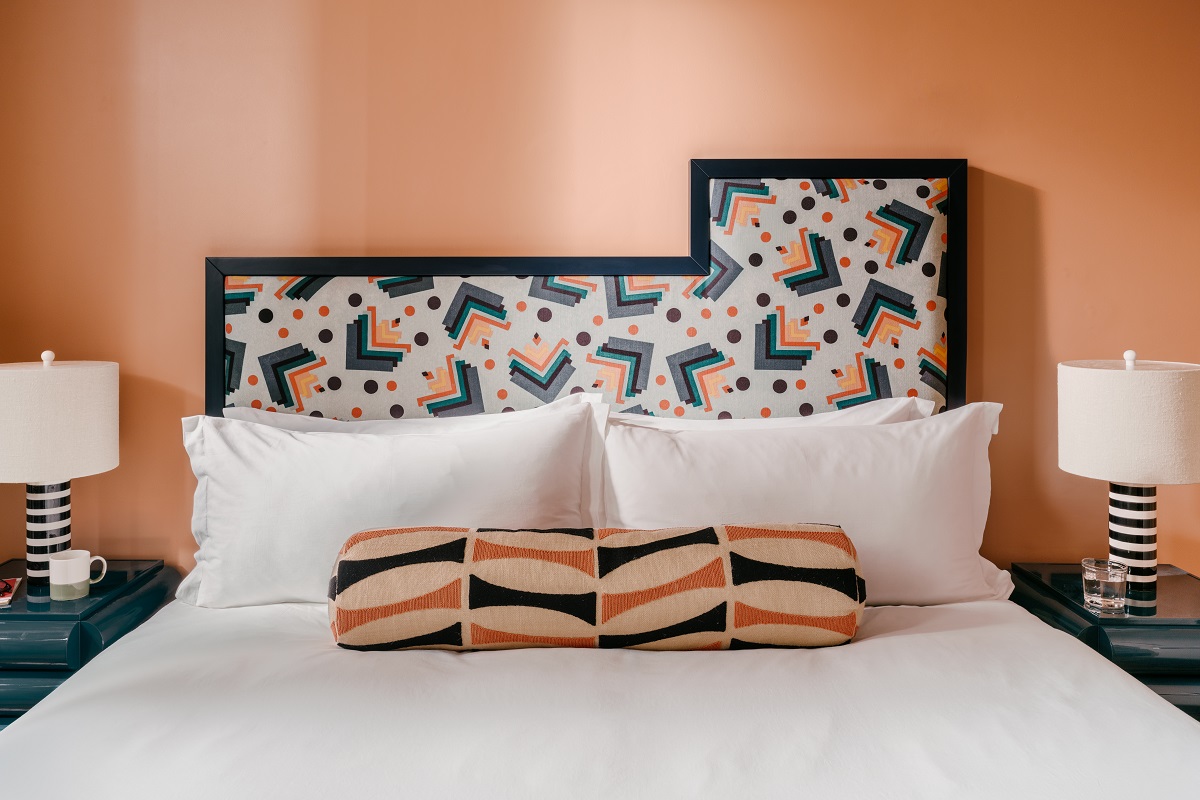 geometric modernist headboard and fabric in the Branzi building in The Hoxton Florence