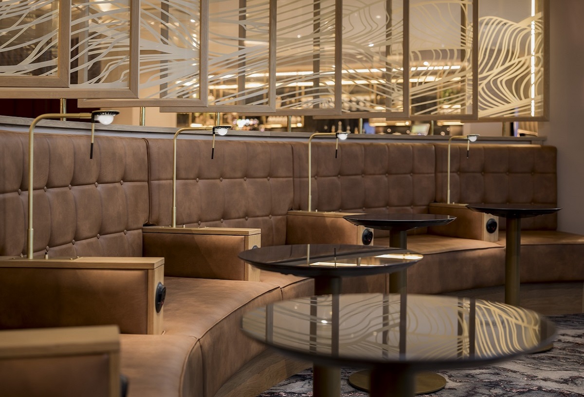 curved banquette seating in Newcastle airport lounge designed by DV8 studio