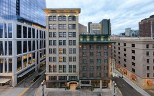 street view and facade of The Woodlark Hotel