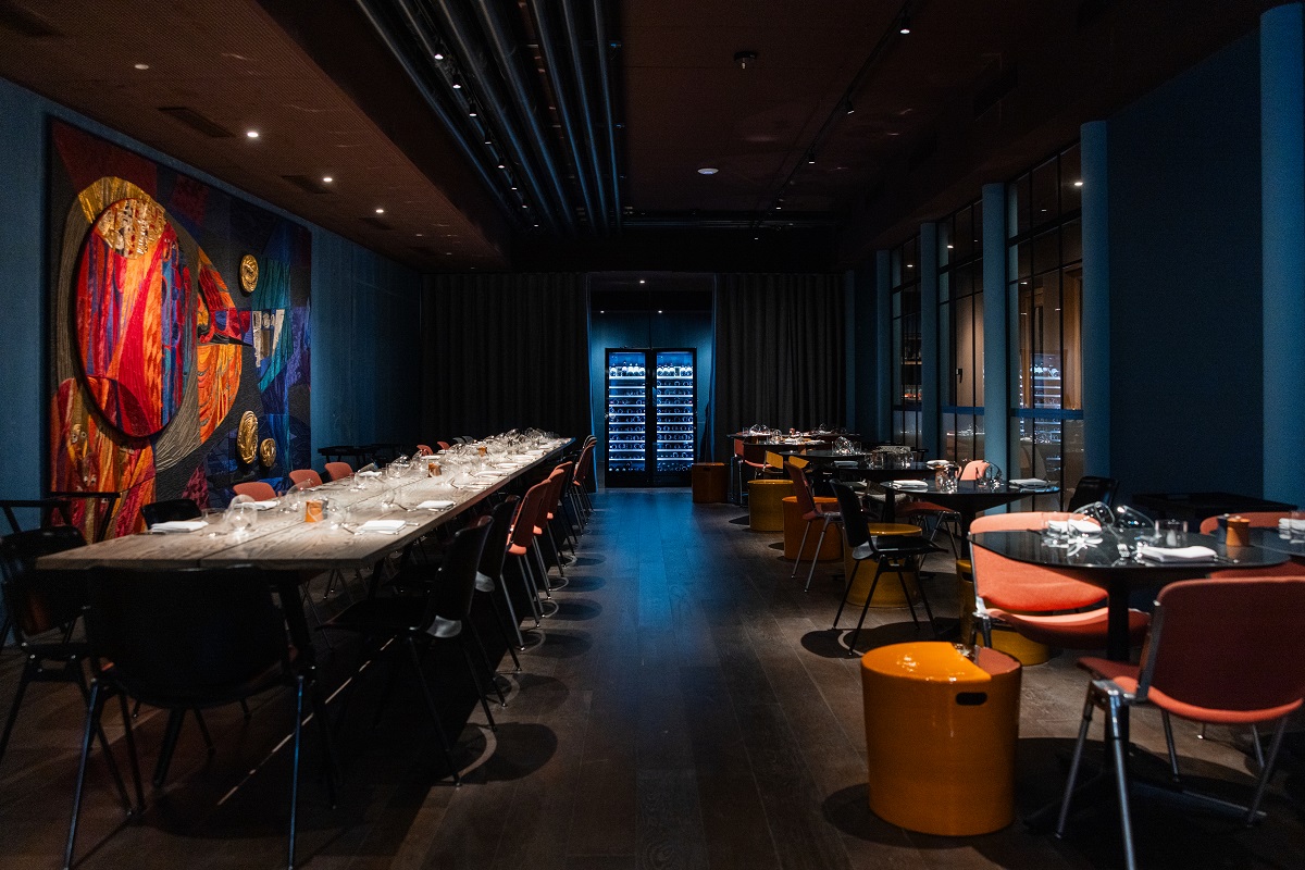dark moody blue and orange in the hotel dining area