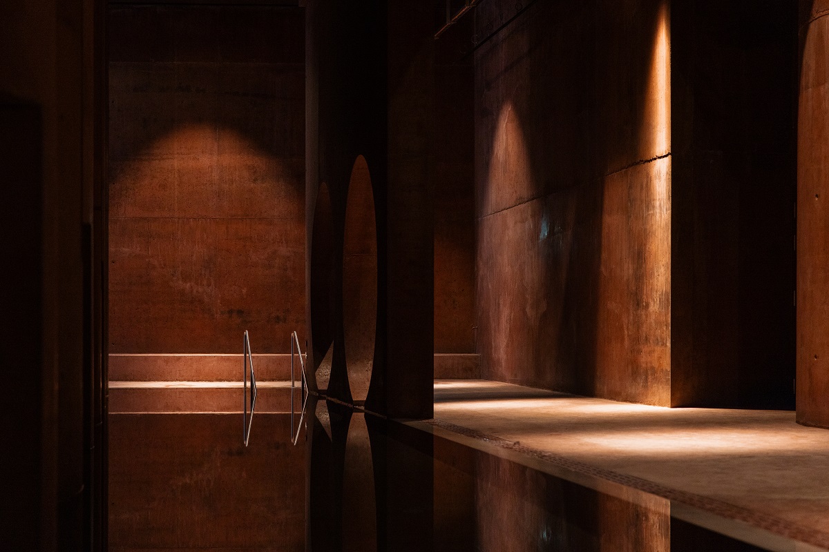 low lighting in underground roman bath pool in Hotel Borsari