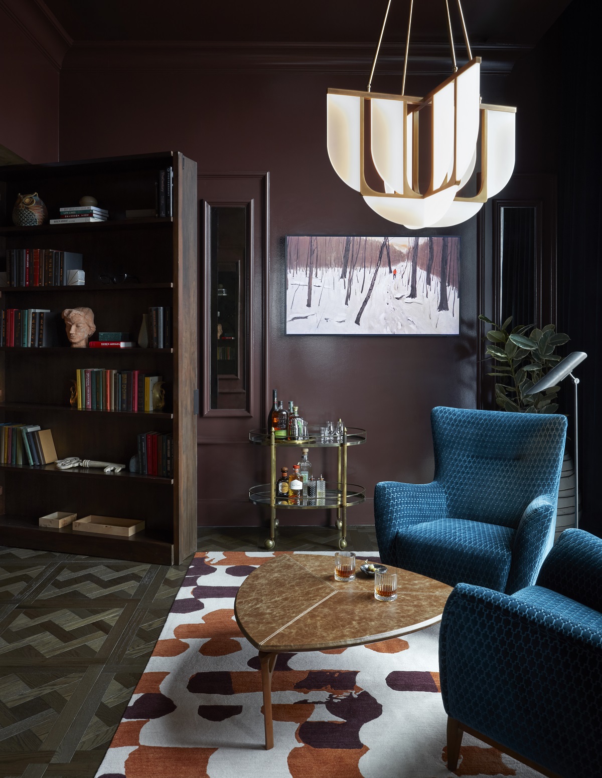 blue velvet seats on patterned tile floor