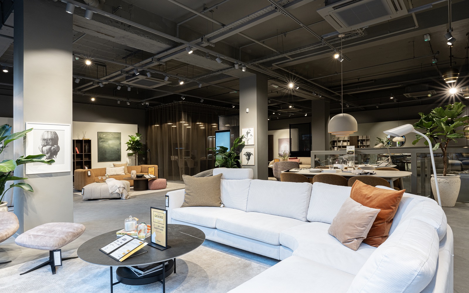 white L shaped sofa in BoConcept new showroom in London