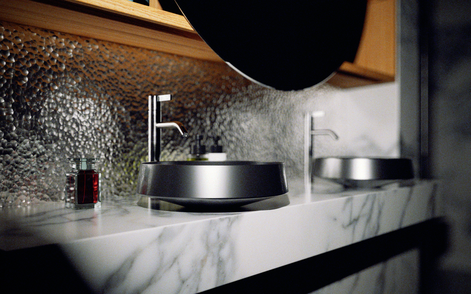 Alape washbasin in steel finish, on grey and white marble countertop with hammered silver metal splashback