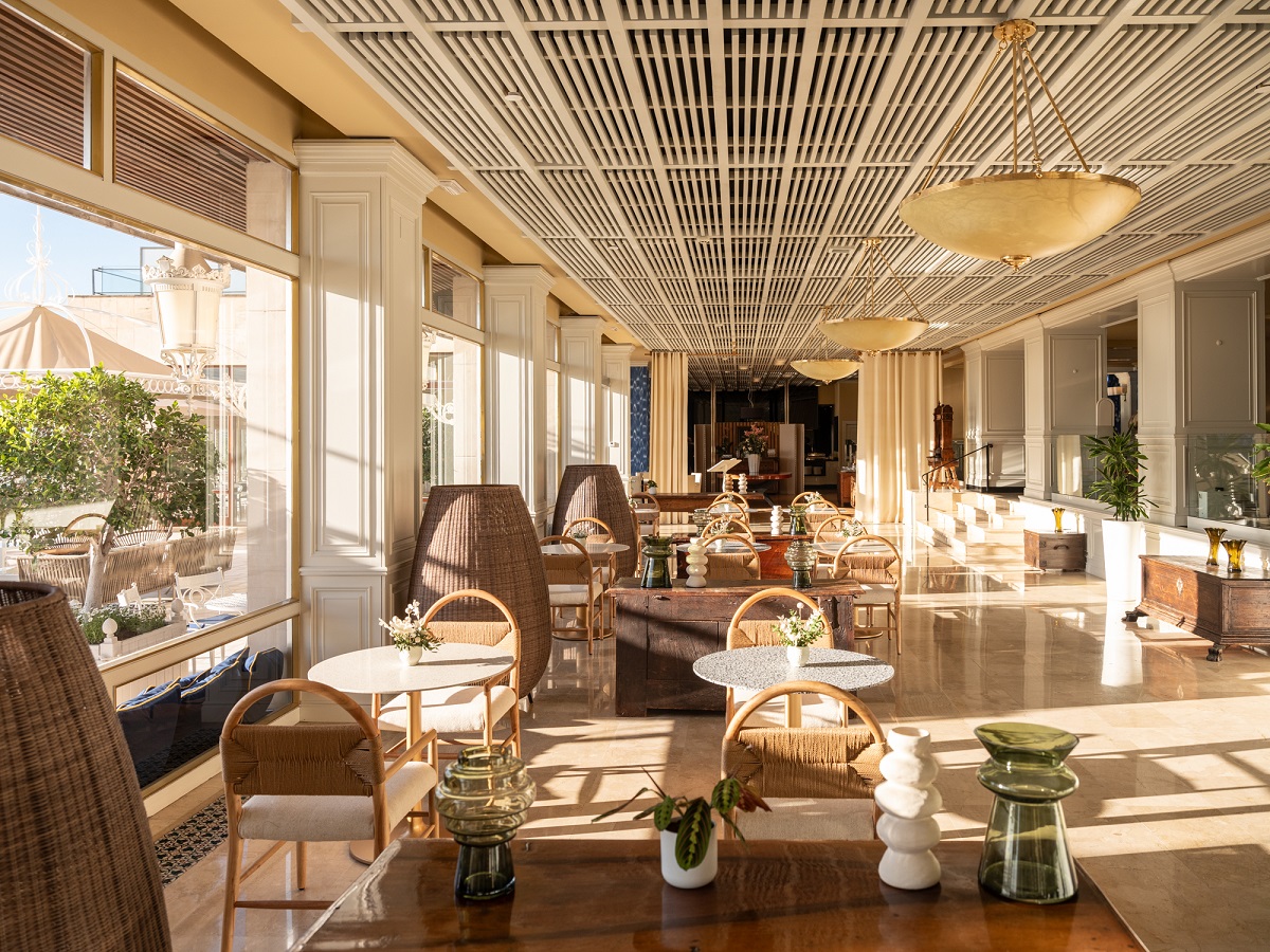 tables and chairs on the hotel terrace with views of Palma and cathedral