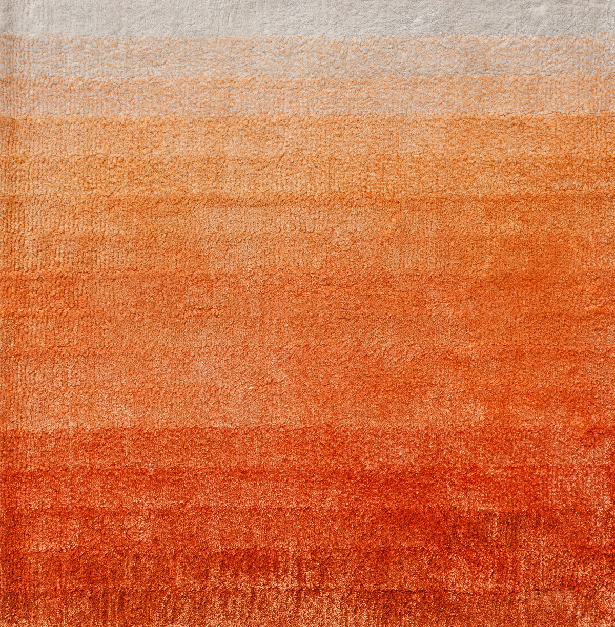 detail of ombre orange carpet