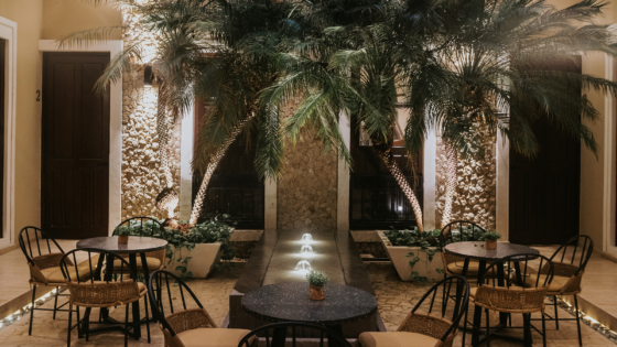 internal courtyard at Kahal with palm trees and fountain