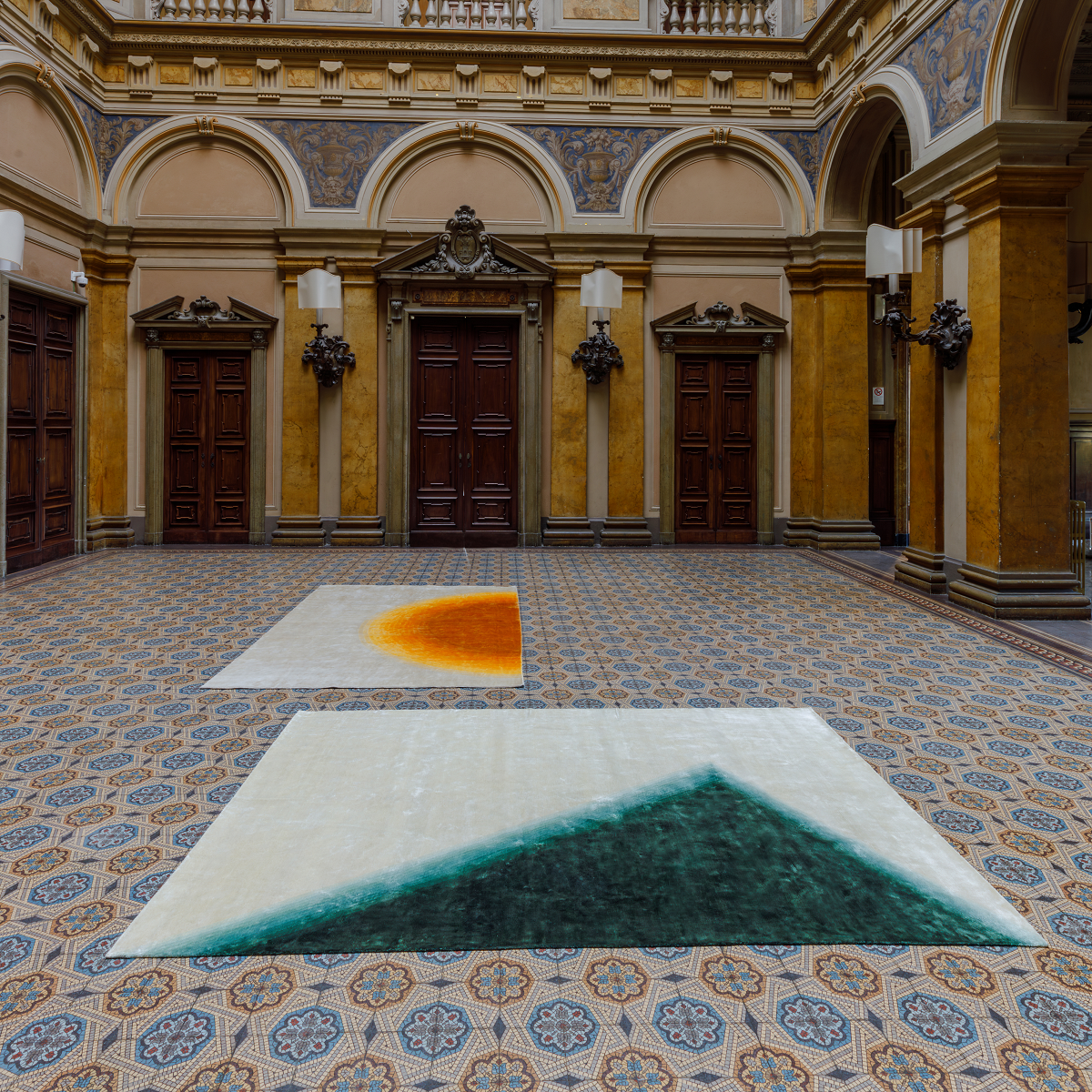 contemporary carpets on tiled floor of old villa