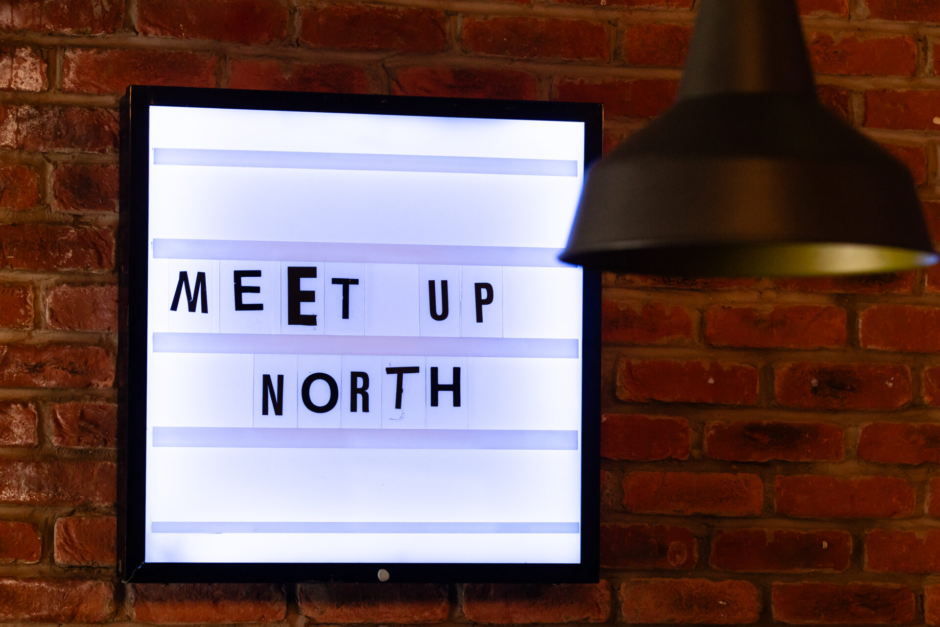 MEET UP North backlit sign