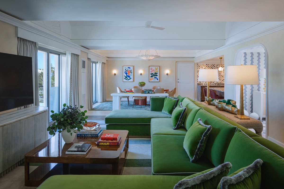 green wrap around couch in suite suite Regent Santa Monica Beach designed by Wimberly Interiors