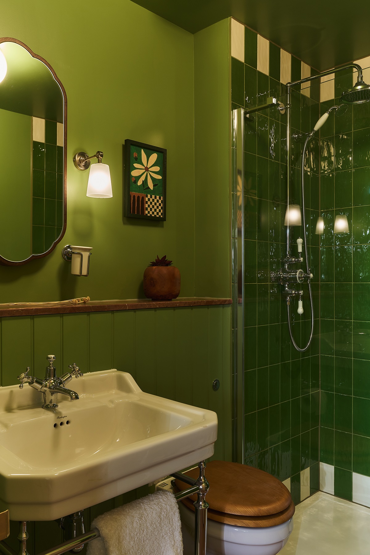 dark green hotel bathroom at Crafted at Powdermills