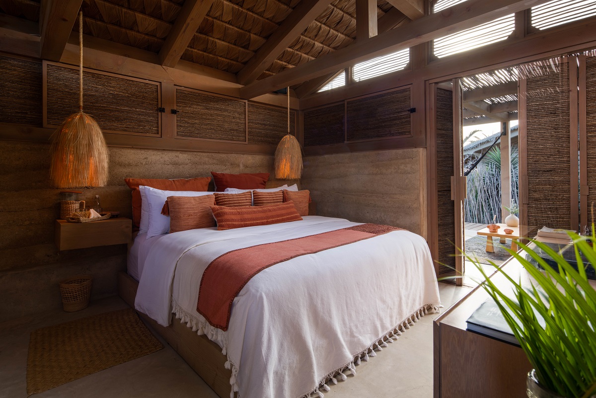 bedroom in hotel cabin in natural materials