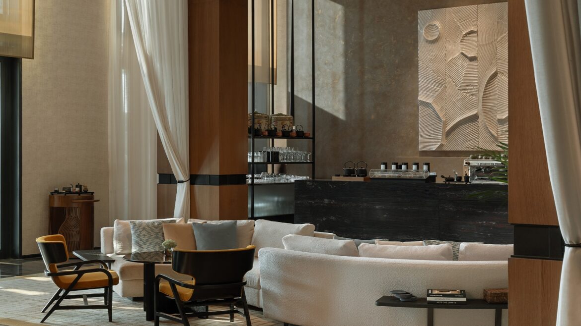 s-shaped sofa and textured surfaces in Banyan Tree by BLINK