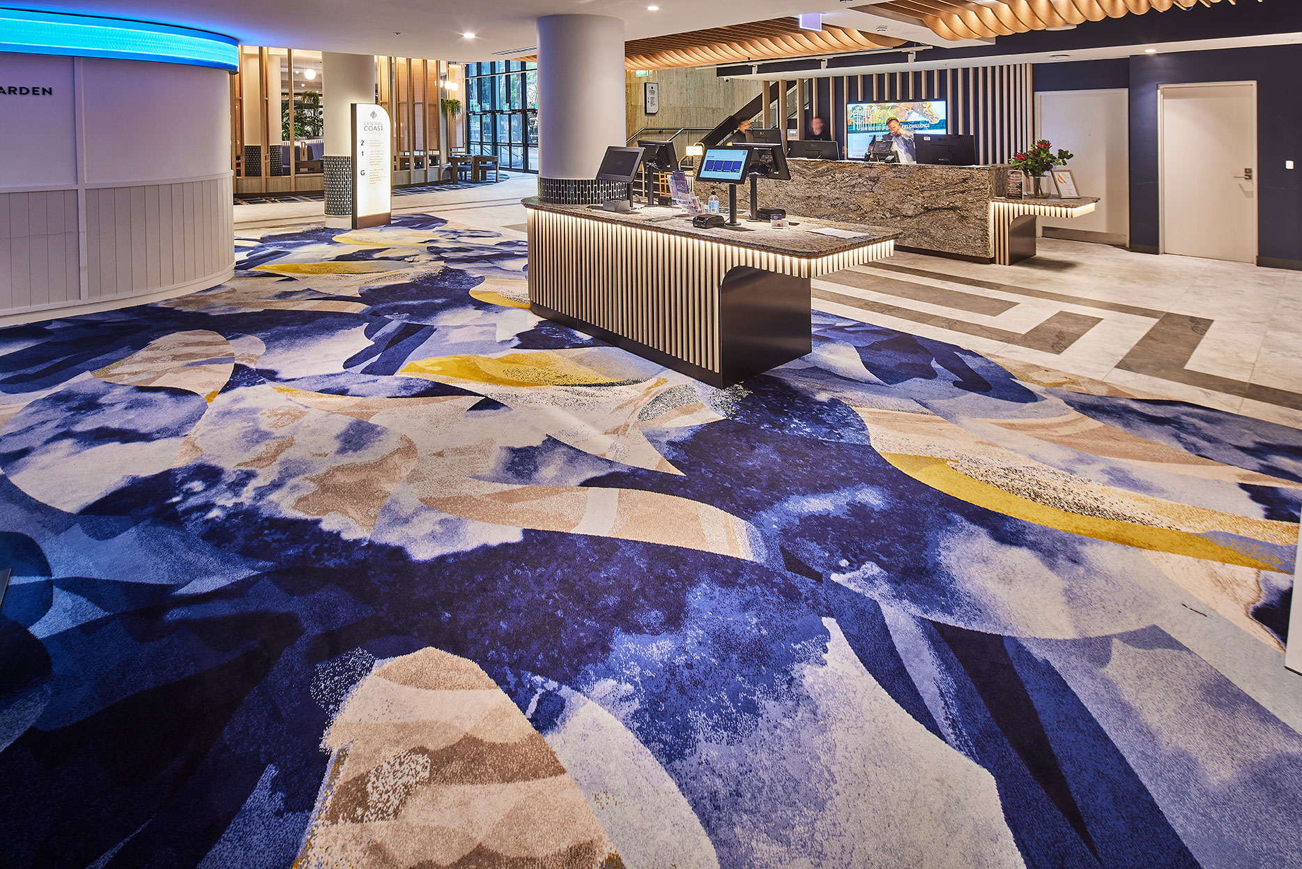 Bespoke Modieus flooring in blue and sandy tones, at the CCLC