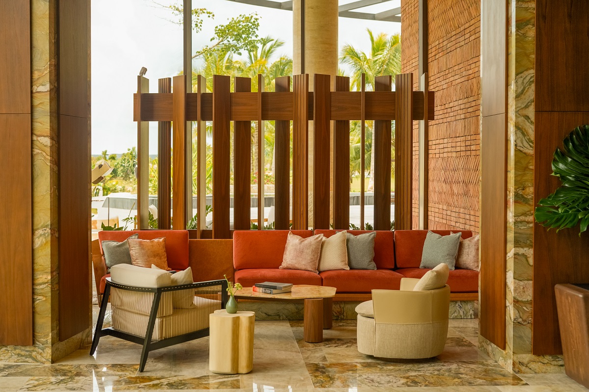seating in the lobby against wooden screen