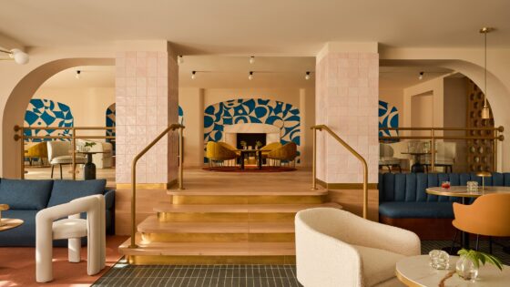 blue mural in back wall of Kimpton Los Monteroa bar with design by El Equipo Creativo