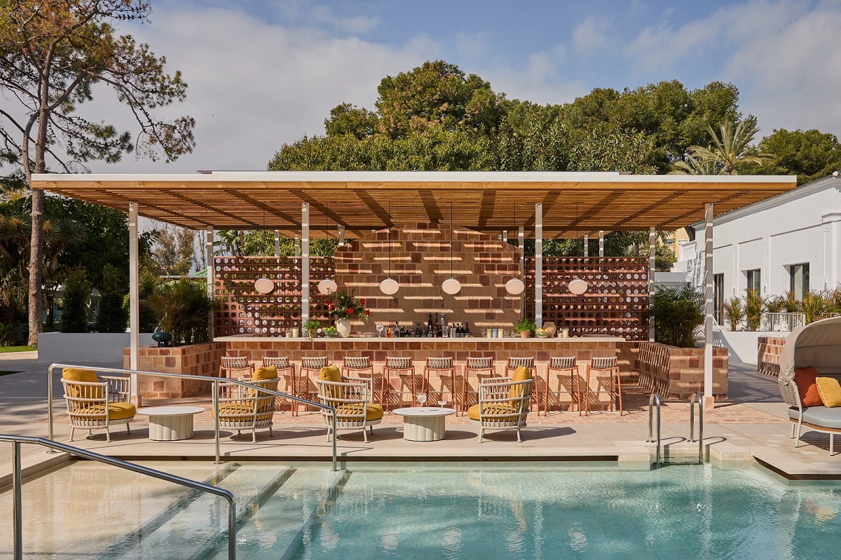 outdoor bar and pool at Kimpton Los Monteros