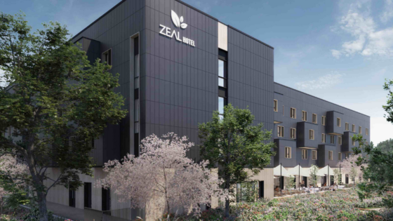 Exterior of Voco Zeal hotel in exeter. Charcoal coloured outer with image taken against dusk sky