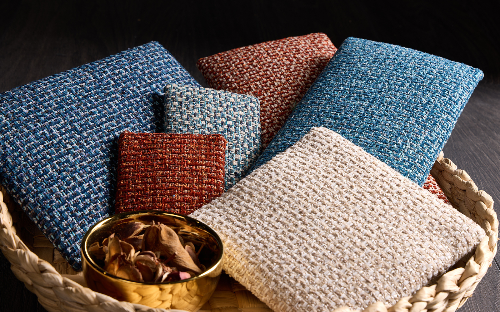 Esme by Skopos fabric swatches in wicker basket