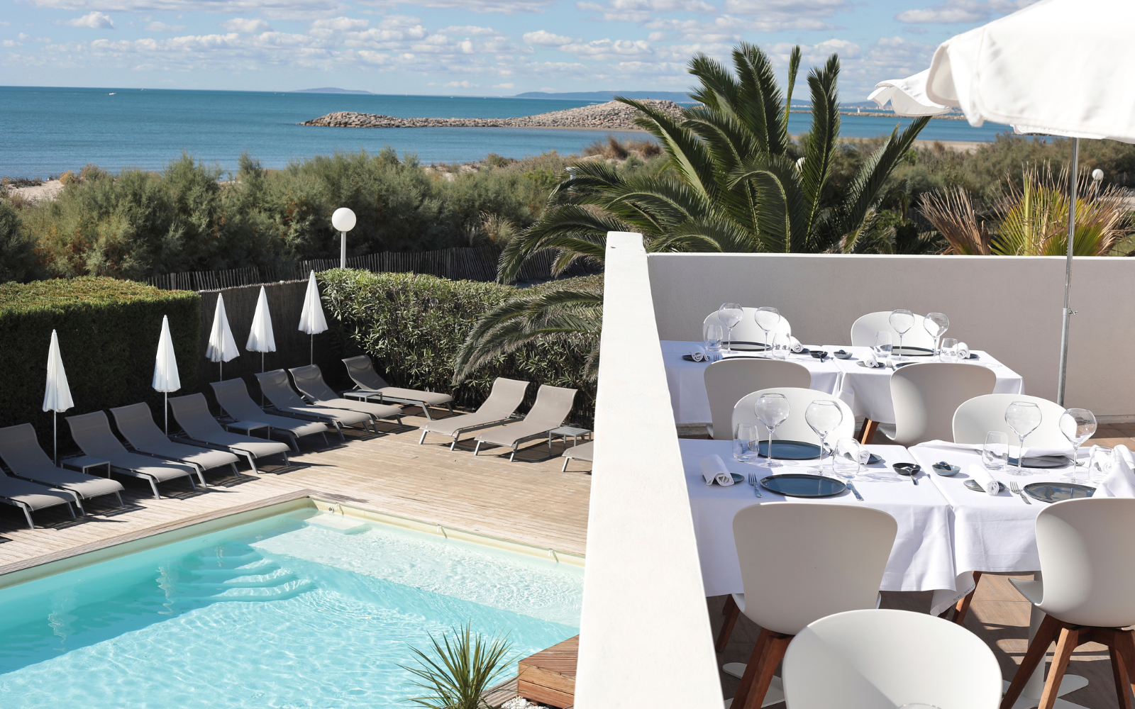 Balcony and pool area with BoConcept furniture