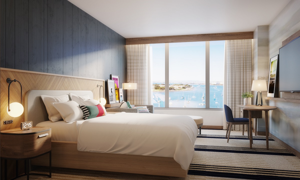 double bed in hotel guest room with ocean view