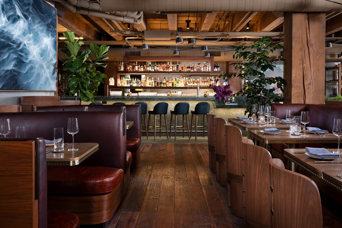 wood surfaces and biophilic planting in restaurant design for Populus