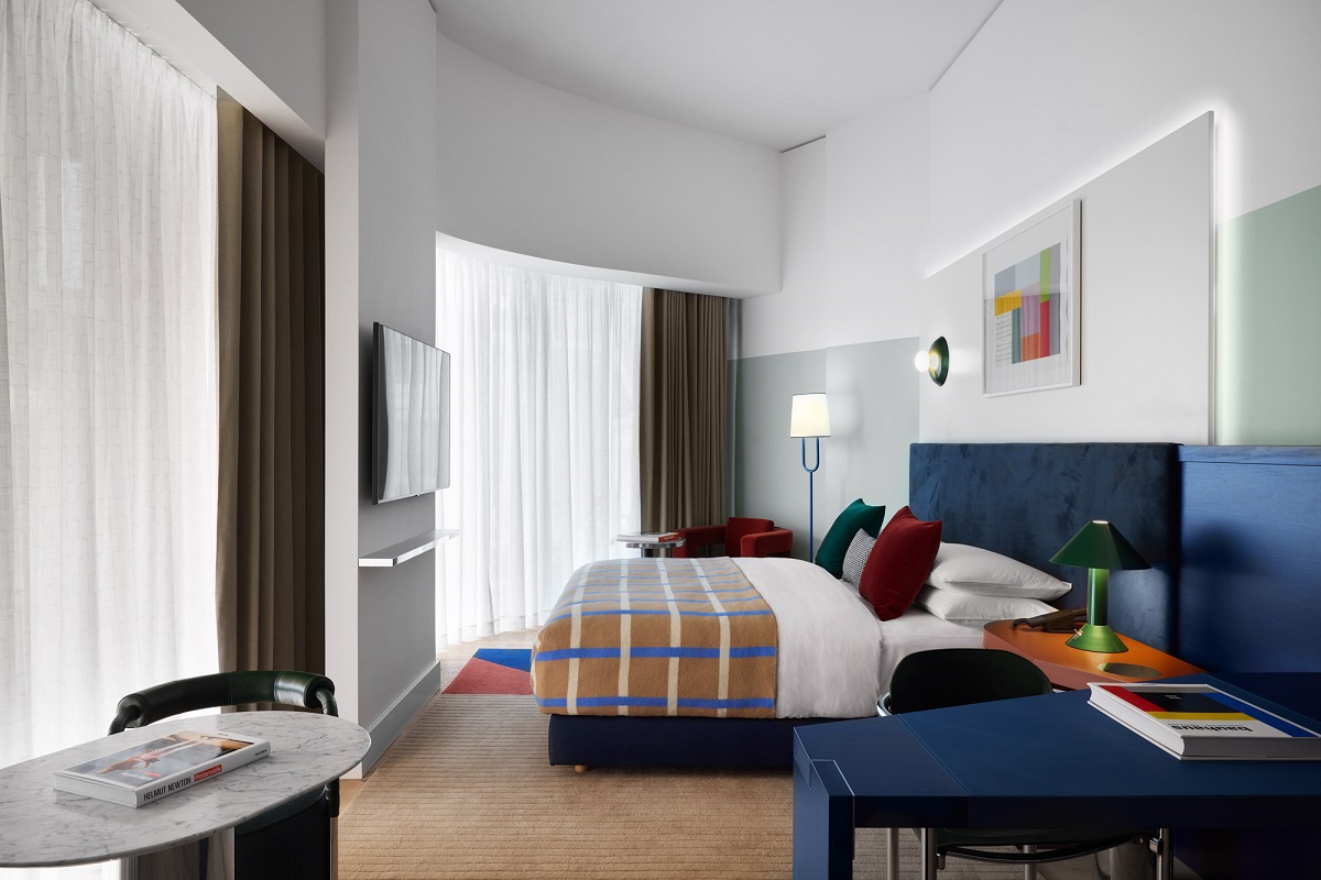 blue, grey and white palette in Kimpton guestroom in Germany