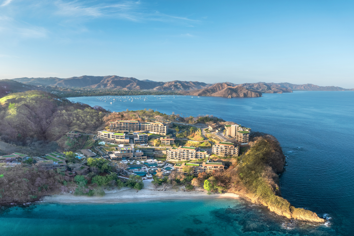 Aerial shot of Waldorf Astoria Costa Rica, a hotel built into a cliff-face