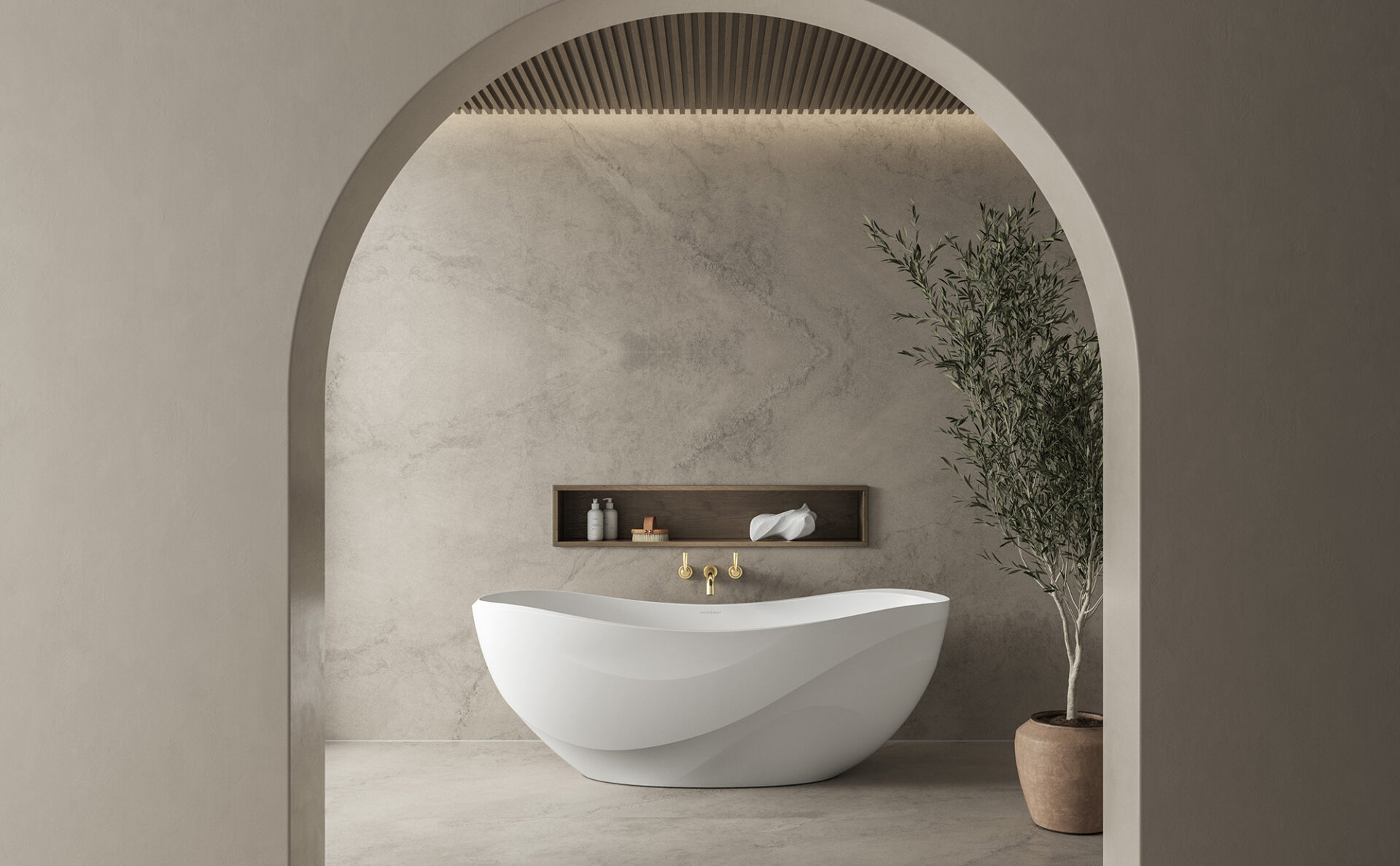 The Seros bath design from House of Rohl. Pictured through archway with olive tree to right