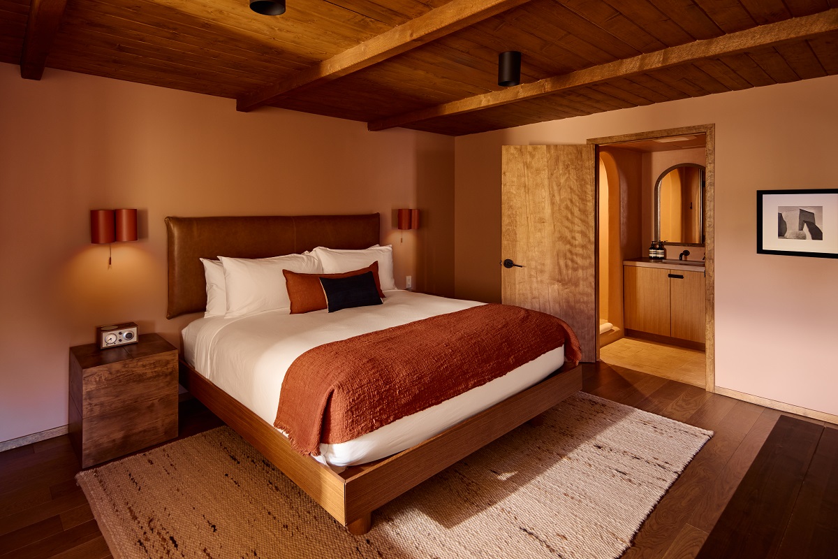 wooden ceilings and wooden furniture in hotel guestroom - Hotel Willa