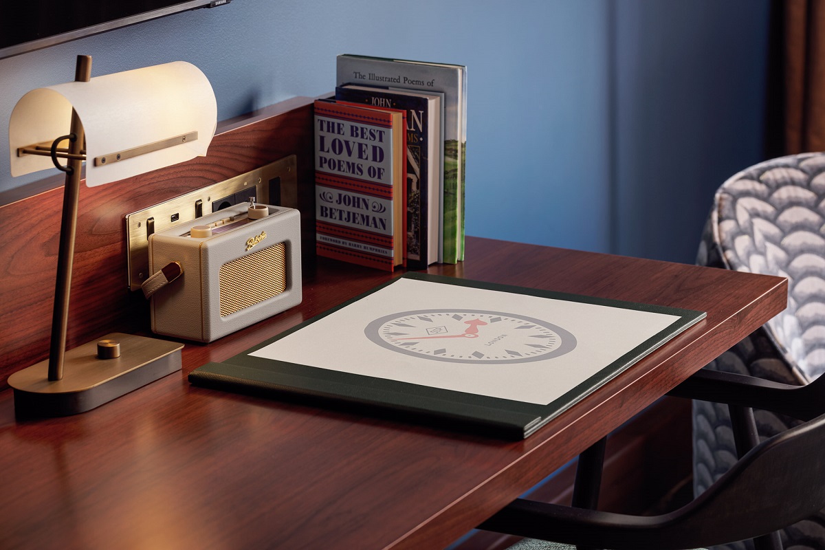 desk detail with books and vintage radio in St Pancras hotel London