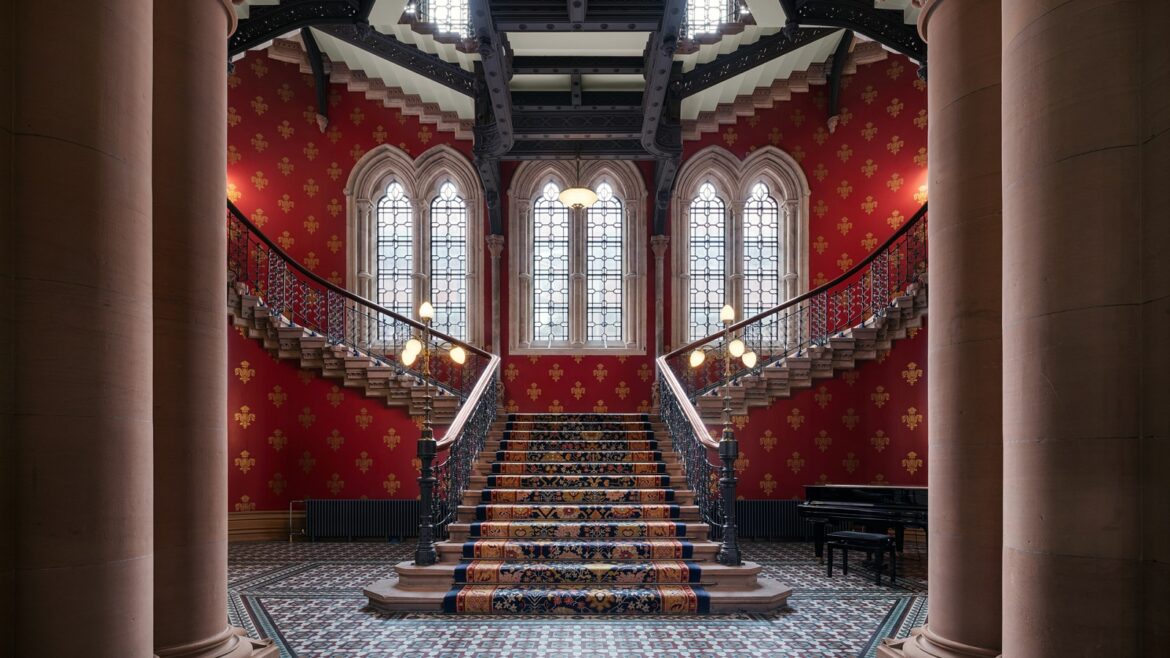 stairway and stained glass windows in St Pancras hotel London