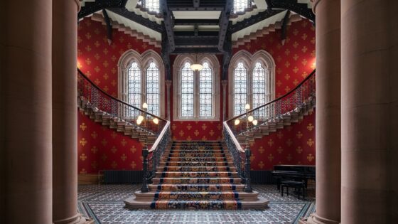 stairway and stained glass windows in St Pancras hotel London