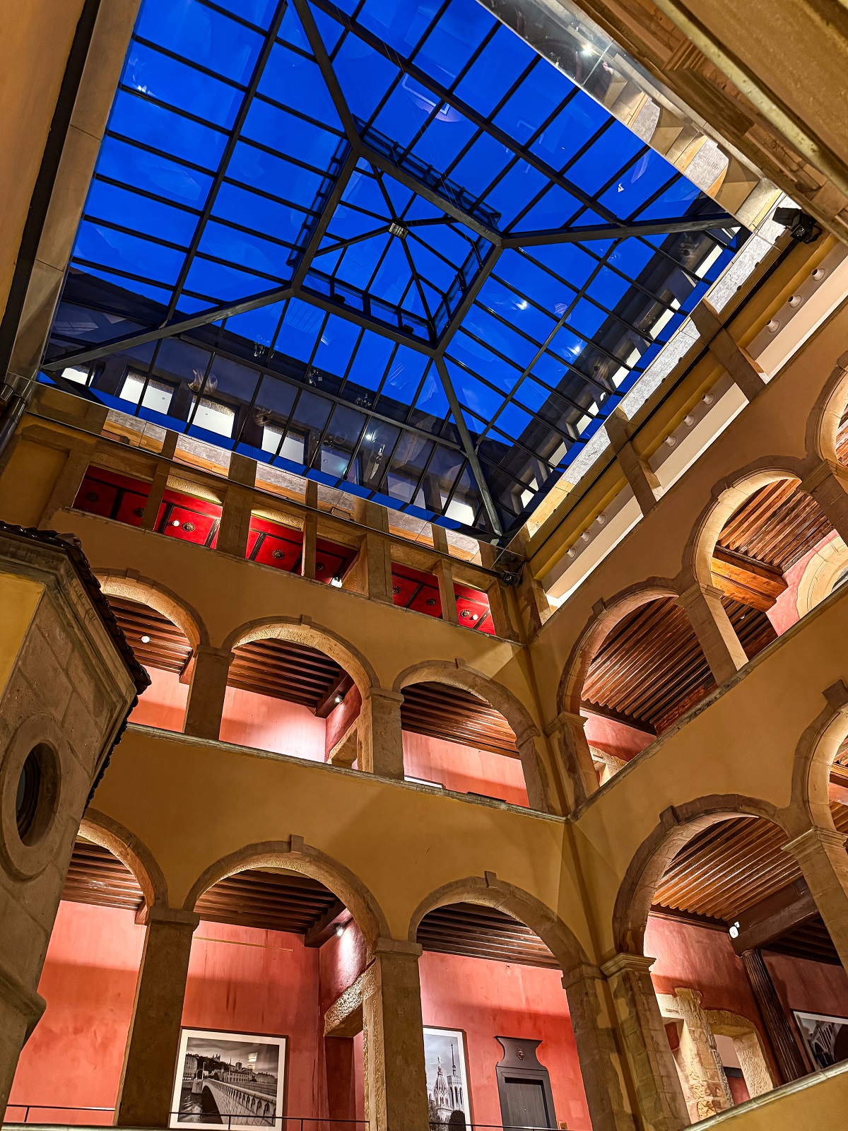 central atrium and medievil arches in Cour des Loges Lyon,