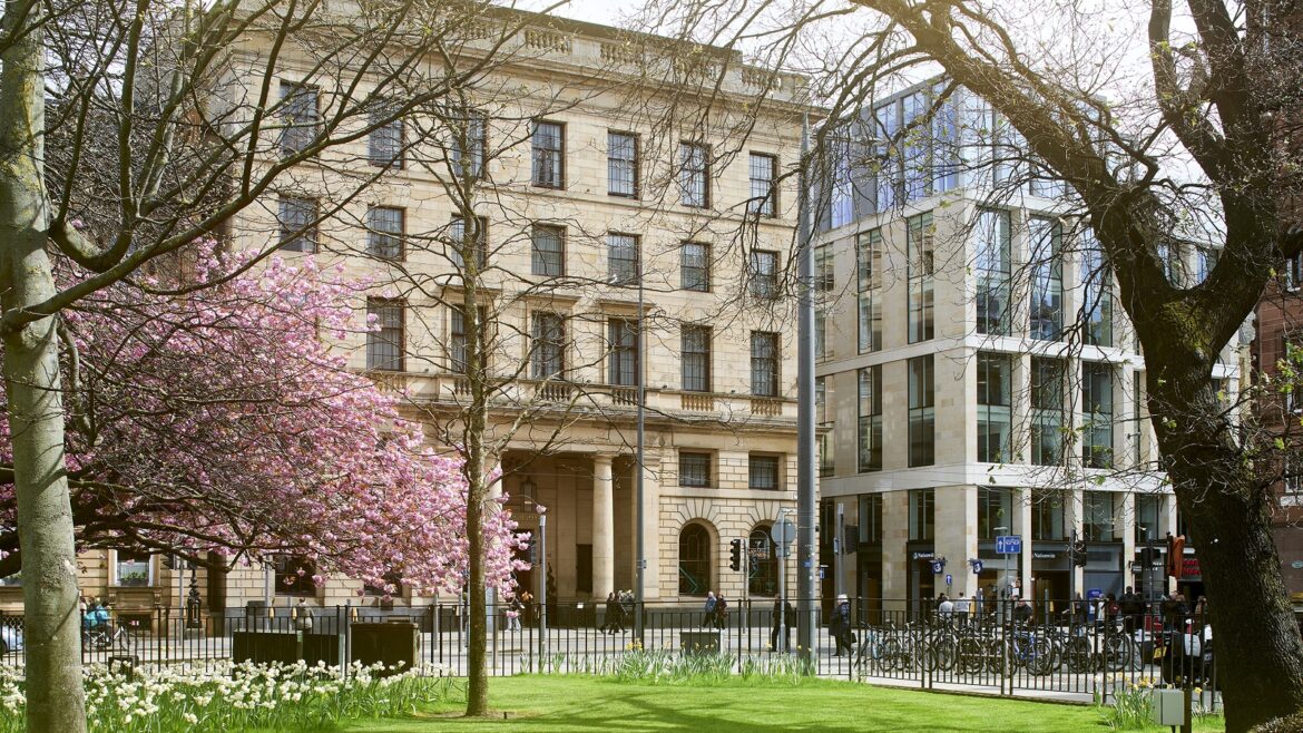 city park and front facade of Edinburgh Grand