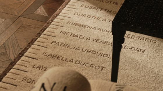 STARK rug designed by Spinocchia Freund. Cream rug with names of female designers and artists listed along the edge
