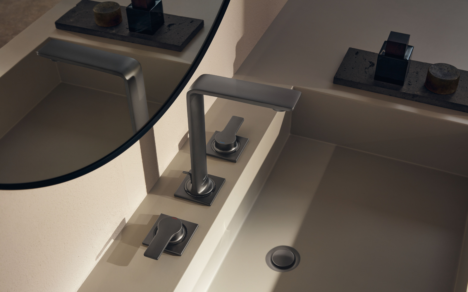 GROHE Allure taps in new Satin Graphite finish, attached to white sink