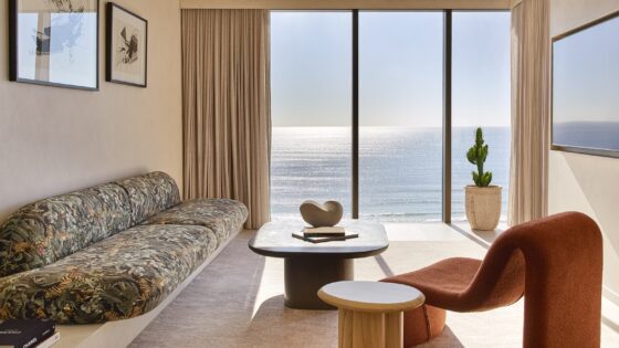 curved chair and sofa with seaview in guestroom Mondrian Gold Coast