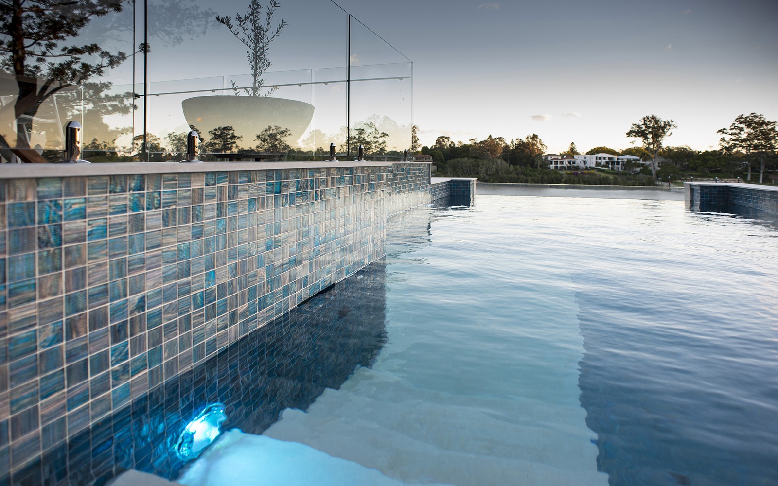 detail of blue mosaic tiles from TREND on swimming pool