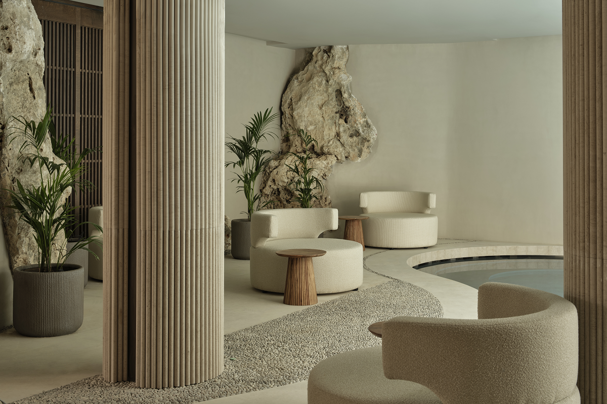 curved furniture and walls with stone pillars in spa entrance