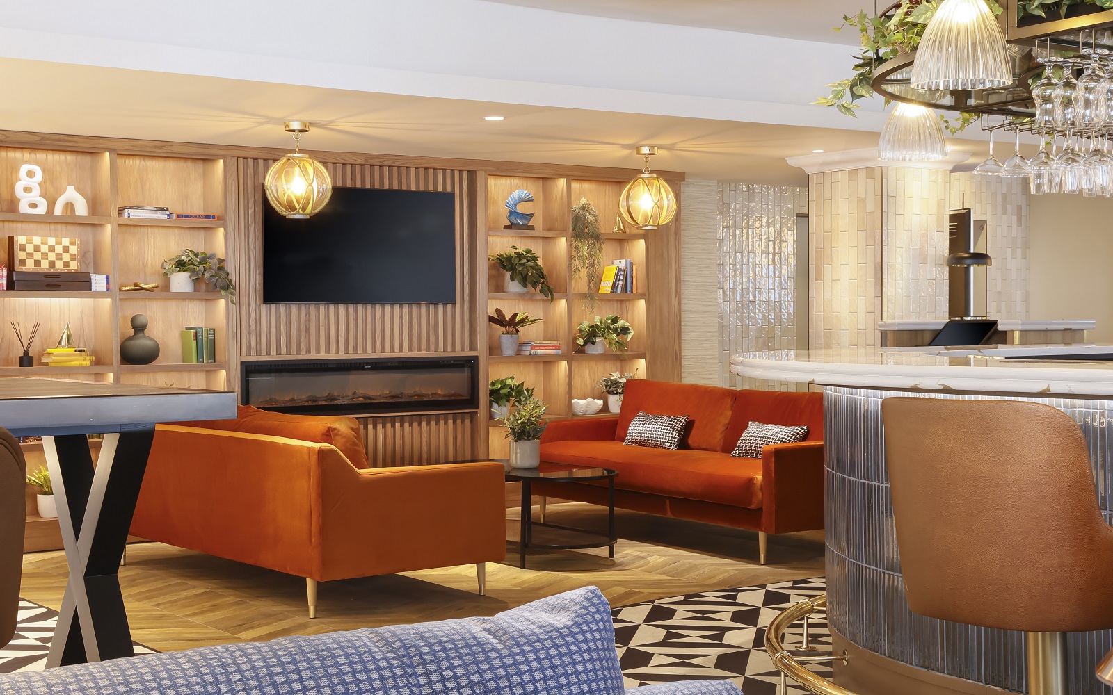 orange sofas and seating in hotel bar design by ABDA Design in voco Southampton