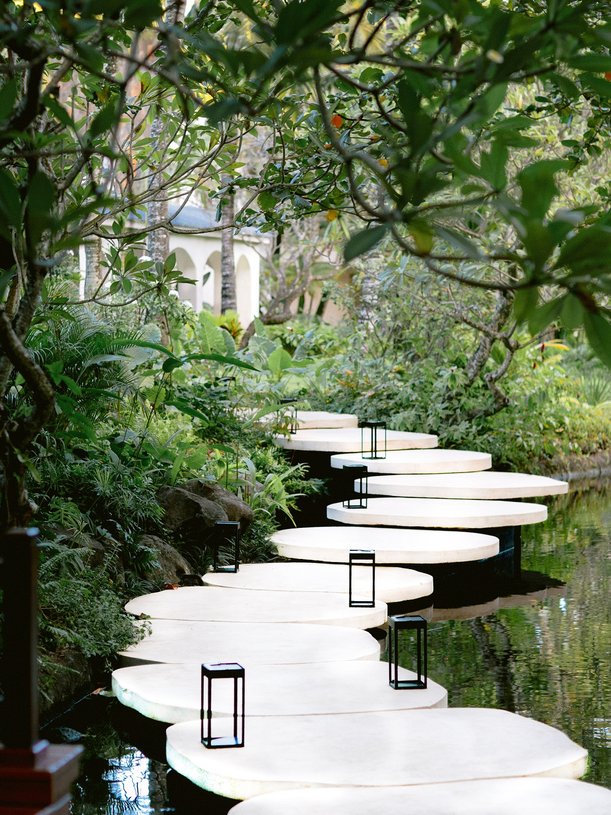 stone path leading though garden to spa